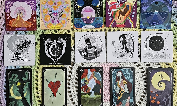 Mother Tarot in row one, Dark Days tarot in row two, and part of Nightmare Before Christmas Tarot in row three depict the five cards previously mentioned.