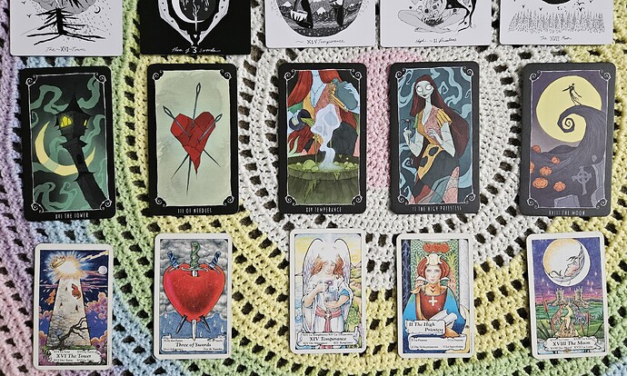 Part of Dark Days tarot in row two, Nightmare Before Christmas Tarot in row three, and Hanson-Roberts Tarot in row four depict the five cards previously mentioned.